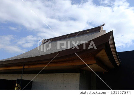 Zen'eiji Temple's beautifully sloped roof stands out against the blue sky Zen'eiji Temple's beautifully sloped roof stands out against the blue sky 131357874