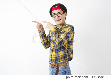Akihabara-style man pointing to the left, white background 131358569