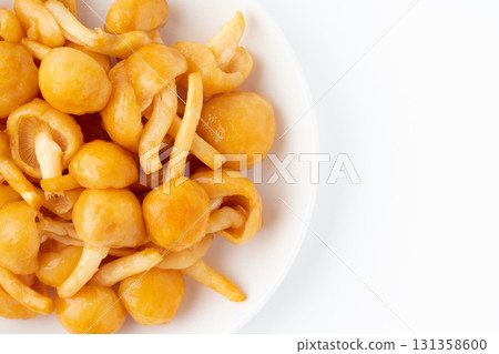 Close-up of large nameko mushrooms on a plate 131358600