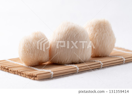 Lion's Mane mushroom or Yamabushitake mushroom on white background Lion's Mane mushroom or Yamabushitake mushroom on white background 131359414