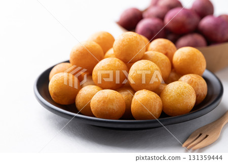 Deep fried sweet potato balls, Thai street food snack Deep fried sweet potato balls, Thai street food snack 131359444