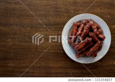 Brown sugar karinto (black karinto) served on a plate on a table background viewed from directly above Brown sugar karinto (black karinto) served on a plate on a table background viewed from directly above 131359857