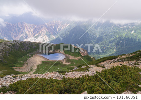 The Hotaka mountain range covered in clouds The Hotaka mountain range covered in clouds 131360351