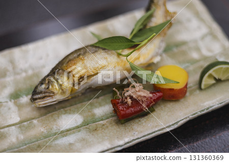 Grilled wild sweetfish served at a traditional Japanese restaurant 131360369