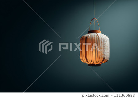 Glowing paper lantern against dark background 131360688