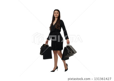 Woman happily carries bags on Black Friday, isolated, PNG Woman happily carries bags on Black Friday, isolated, PNG 131361427