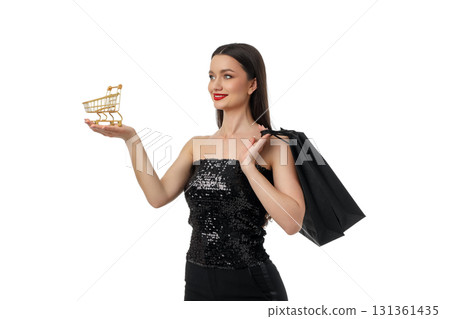Woman showcases excitement for Black Friday sales, isolated, PNG Woman showcases excitement for Black Friday sales, isolated, PNG 131361435