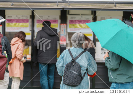 Tourists sightseeing at Hirosaki Cherry Blossom Festival, traveling in Hirosaki castle park, Aomori, Tohoku, Japan. Landmark famous in Japan. Travel and Vacation destination 131361624