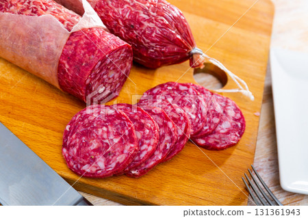 Salchichon, traditional spanish dry cured pork sausage on table 131361943