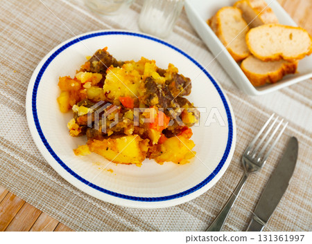 Stewed beef with potatoes on plate Stewed beef with potatoes on plate 131361997