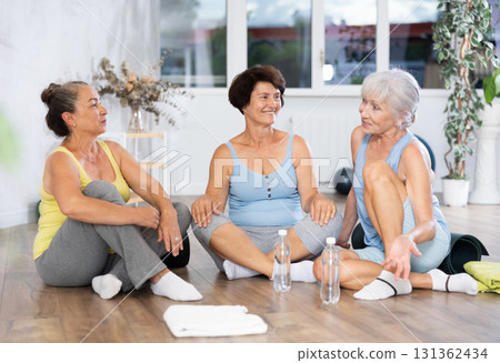 Group of elderly women talking in fitness studio 131362434