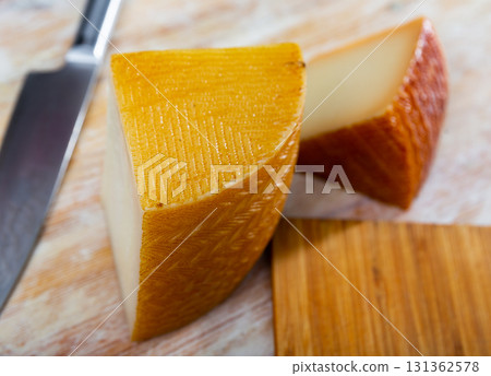 View of a pieces of semi-hard cheese 131362578