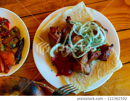 Oriental grilled pork meat shashlik Oriental grilled pork meat shashlik 131362592