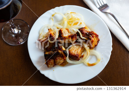Grilled pork meat shashlik with sliced onion Grilled pork meat shashlik with sliced onion 131362914