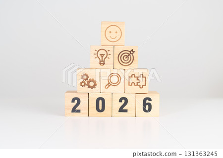 Happy New Year 2026 block with wood block with business goal, strategy, target, mission, action, objective, teamwork, research, feedback and idea concept Happy New Year 2026 block with wood block with business goal, strategy, target, mission, action, objective, teamwork, research, feedback and idea concept 131363245