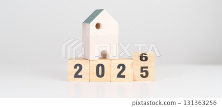 2025 end year to Happy New Year 2026 with house model. real estate, Home loan and mortgage, tax, investment, financial, savings and New Year Resolution concepts 2025 end year to Happy New Year 2026 with house model. real estate, Home loan and mortgage, tax, investment, financial, savings and New Year Resolution concepts 131363256