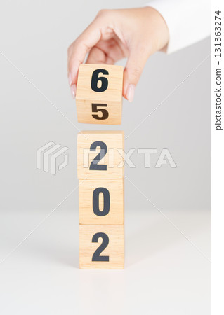 2025 change to 2026 year block on table. goal, Resolution, strategy, plan, start, budget, mission, action, motivation and New Year concepts 131363274