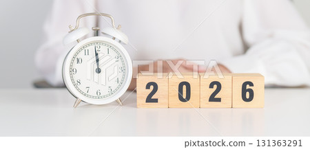 Happy New Year 2026 with vintage alarm clock. Christmas, New Start, Resolution, countdown, Goals, Plan, Action and Motivation Concept Happy New Year 2026 with vintage alarm clock. Christmas, New Start, Resolution, countdown, Goals, Plan, Action and Motivation Concept 131363291