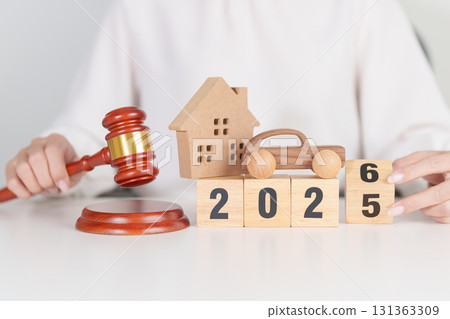 Happy New Year 2026 with house and Car model and gavel justice hammer on desk in courthouse. Real Estate and Car Law, Home Insurance, property Tax, Auction and Bidding concepts Happy New Year 2026 with house and Car model and gavel justice hammer on desk in courthouse. Real Estate and Car Law, Home Insurance, property Tax, Auction and Bidding concepts 131363309