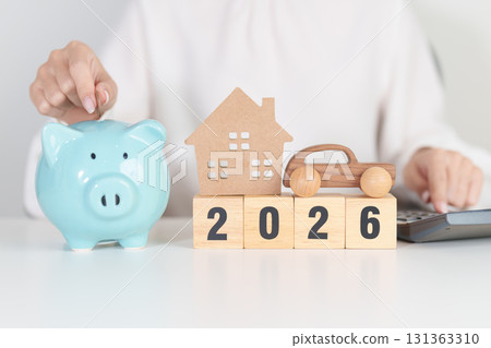 Happy New Year 2026 with car and Home model with coin stack. Car loan, Interest rate, real estate, house, Insurance, Financial, Repair, Tax, mortgage and Maintenance Happy New Year 2026 with car and Home model with coin stack. Car loan, Interest rate, real estate, house, Insurance, Financial, Repair, Tax, mortgage and Maintenance 131363310