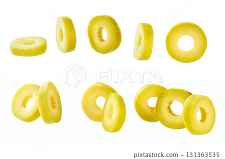 marinated sliced green olives isolated on white background. marinated sliced green olives isolated on white background. 131363535