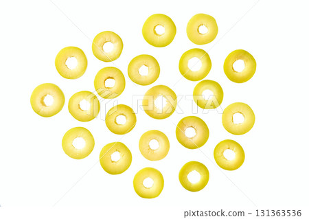 Green olives sliced isolated on a white background, top view. marinated sliced green olives isolated. Green olives sliced isolated on a white background, top view. marinated sliced green olives isolated. 131363536