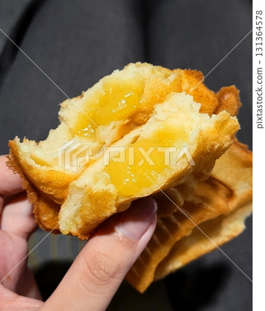 Bungeoppang, bungeo-ppang (Korean Fish Shaped Pastry), popular snack, cookies, sweet in winter streets of Korea. Bungeoppang - Korean traditional national food, dish, cuisine. Japanese taiyaki 131364578