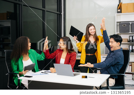 Diverse teams celebrating success in a lively office setting, capturing moments of joy, teamwork Diverse teams celebrating success in a lively office setting, capturing moments of joy, teamwork 131365195