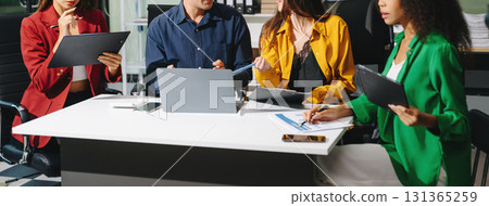 Multiracial group of young creative people in smart casual wear discussing business brainstorming meeting ideas design project. 131365259