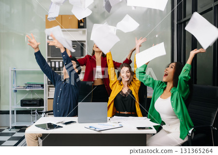 Diverse teams celebrating success in a lively office setting, capturing moments of joy, teamwork Diverse teams celebrating success in a lively office setting, capturing moments of joy, teamwork 131365264