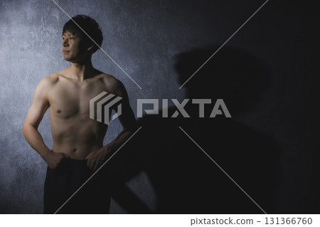 Men doing muscle training with dumbbells Men doing muscle training with dumbbells 131366760