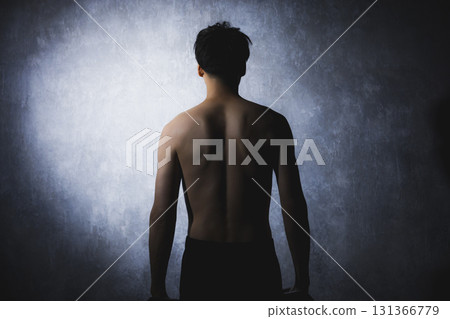 Men doing muscle training with dumbbells 131366779