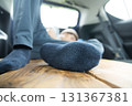 A man sleeping in his car 131367381