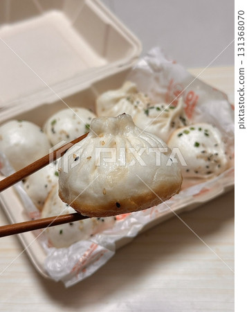 Jjinppang, soft and fluffy steamed buns filled with sweet red bean paste or savory fillings. A warm, comforting Korean snack perfect for any time of the day. Jjinppang, soft and fluffy steamed buns filled with sweet red bean paste or savory fillings. A warm, comforting Korean snack perfect for any time of the day. 131368070