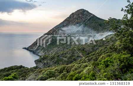 Coastline view Roadtrip Winding road along rocky coast of Cap Corse peninsula on Corsica island France Coastline view Roadtrip Winding road along rocky coast of Cap Corse peninsula on Corsica island France 131368319
