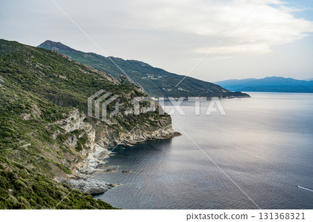 Coastline view Roadtrip Winding road along rocky coast of Cap Corse peninsula on Corsica island France 131368321