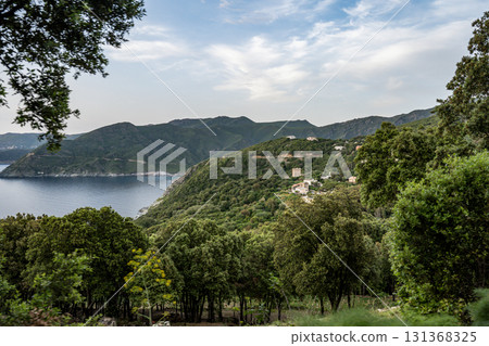 Village beach view Roadtrip Winding road along rocky coast of Cap Corse peninsula on Corsica island France Village beach view Roadtrip Winding road along rocky coast of Cap Corse peninsula on Corsica island France 131368325