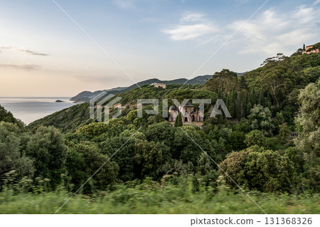 Coastline view Roadtrip Winding road along rocky coast of Cap Corse peninsula on Corsica island France 131368326