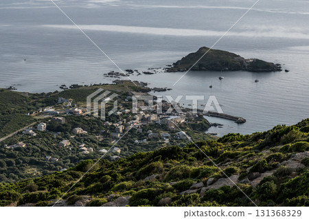 Village beach view Roadtrip Winding road along rocky coast of Cap Corse peninsula on Corsica island France Village beach view Roadtrip Winding road along rocky coast of Cap Corse peninsula on Corsica island France 131368329