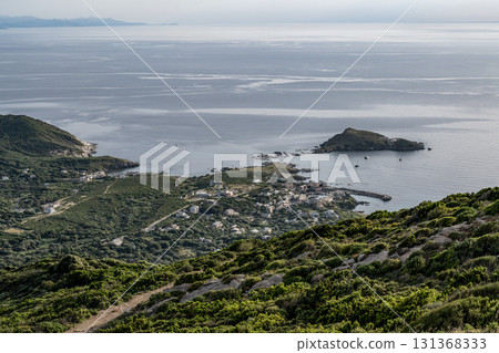 Village beach view Roadtrip Winding road along rocky coast of Cap Corse peninsula on Corsica island France Village beach view Roadtrip Winding road along rocky coast of Cap Corse peninsula on Corsica island France 131368333