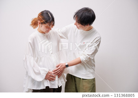 Couple facing each other, pregnant woman, maternity Couple facing each other, pregnant woman, maternity 131368805