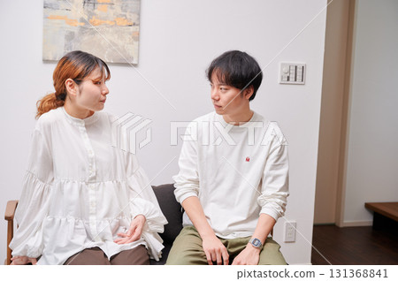 Couple facing each other, pregnant woman, maternity Couple facing each other, pregnant woman, maternity 131368841