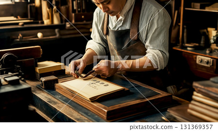 An old man is focusing on bookbinding in studio, carpentry, craftsmanship and handwork concept. Traditional Japanese style 131369357