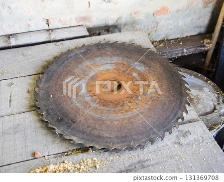 Disc circular saw. Drive for sawing wood 131369708