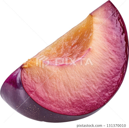 Close up of a fresh plum slice showing its vibrant flesh and skin 131370010