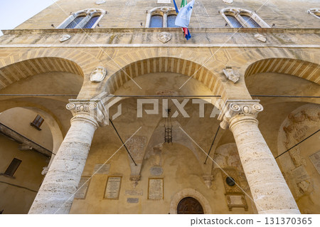 Palazzo Comunale arches and columns in Pienza, Tuscany 131370365