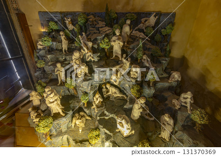 Nativity scene figures representing everyday life activities Nativity scene figures representing everyday life activities 131370369