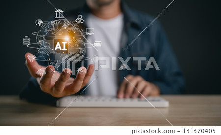 Digital representation of artificial intelligence technology overlaid on a globe held by a person in a casual setting with a keyboard nearby 131370405