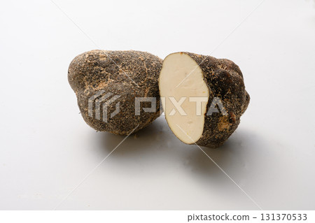 Wild yam from Tanba Sasayama on a white background Wild yam from Tanba Sasayama on a white background 131370533