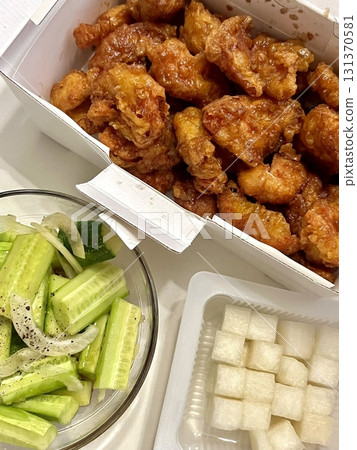 Crispy fried chicken with golden, crunchy skin and juicy, tender meat. A delicious and savory dish, perfect for any meal, served with dipping sauces or side dishes for extra flavor! 131370581